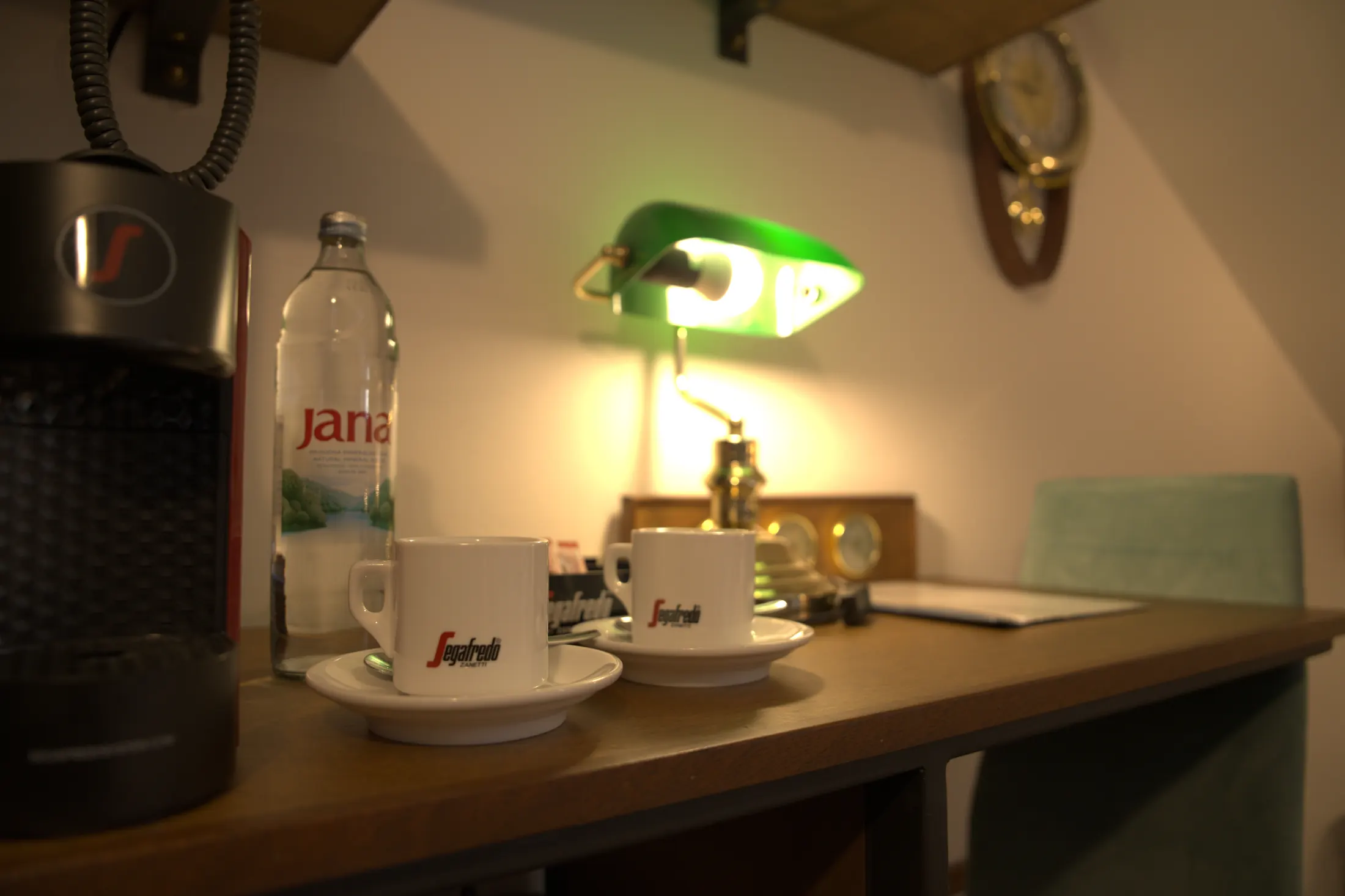 The coffee machine, cups and desk with a green lamp, Hotel Villa Diana, Lučac, Split