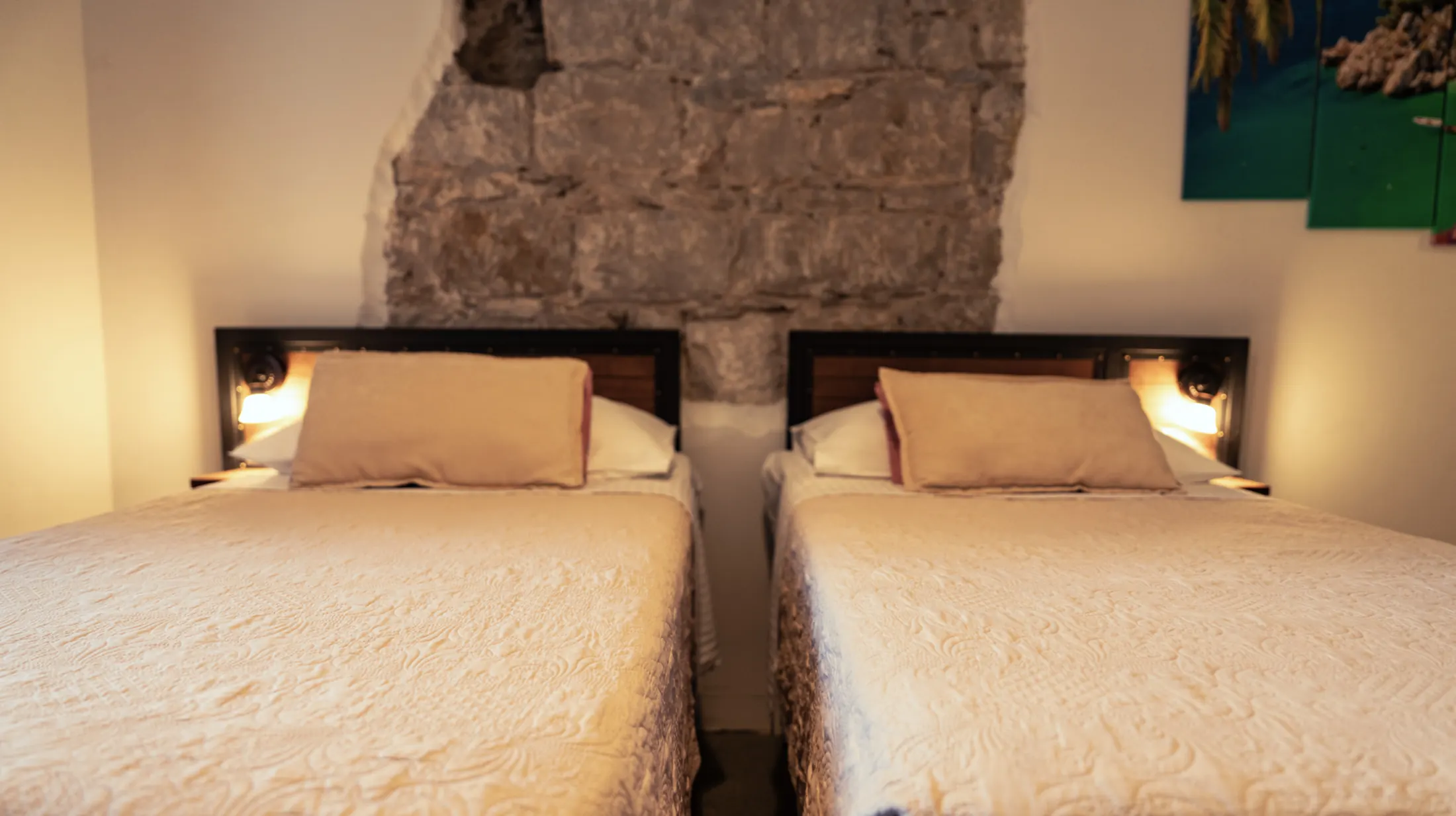 The beds against a stone wall, Hotel Villa Diana, Lučac, Split