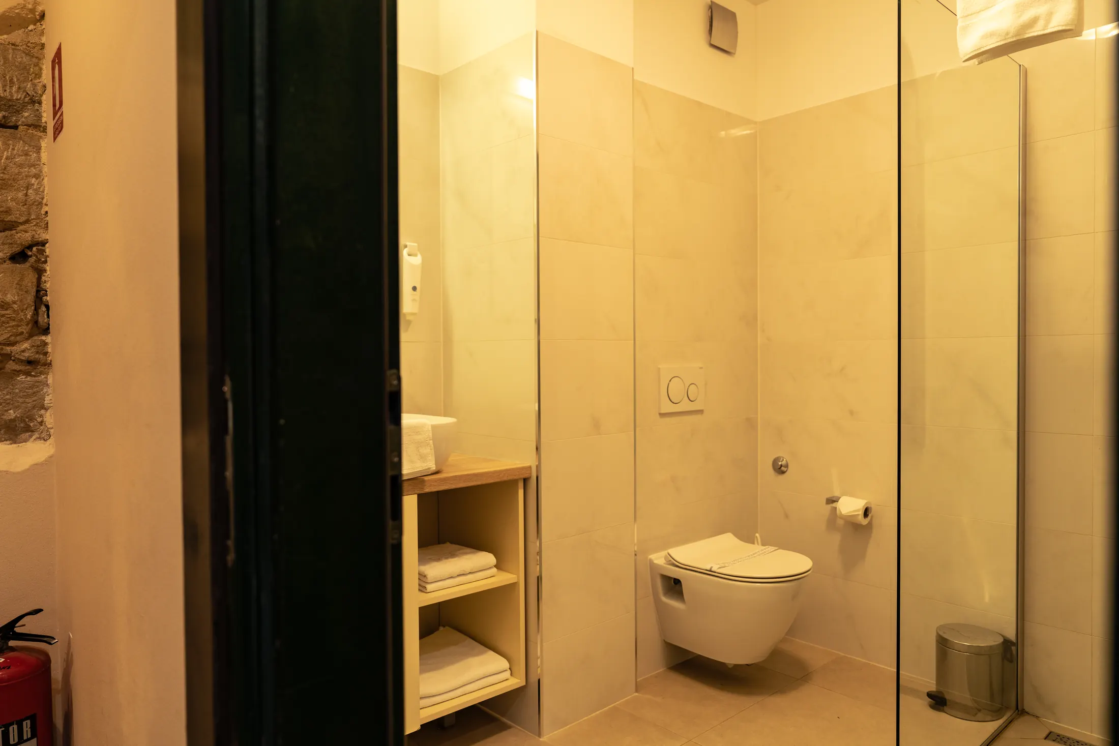 The bathroom with open shelves and folded towels, Hotel Villa Diana, Lučac, Split